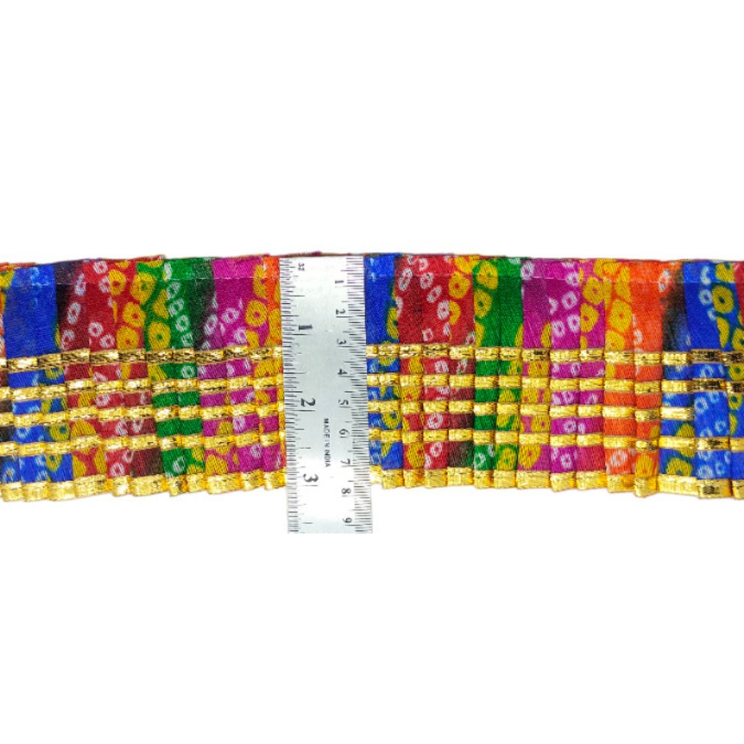 Colorful candy bars with a ruler for scale on a white background