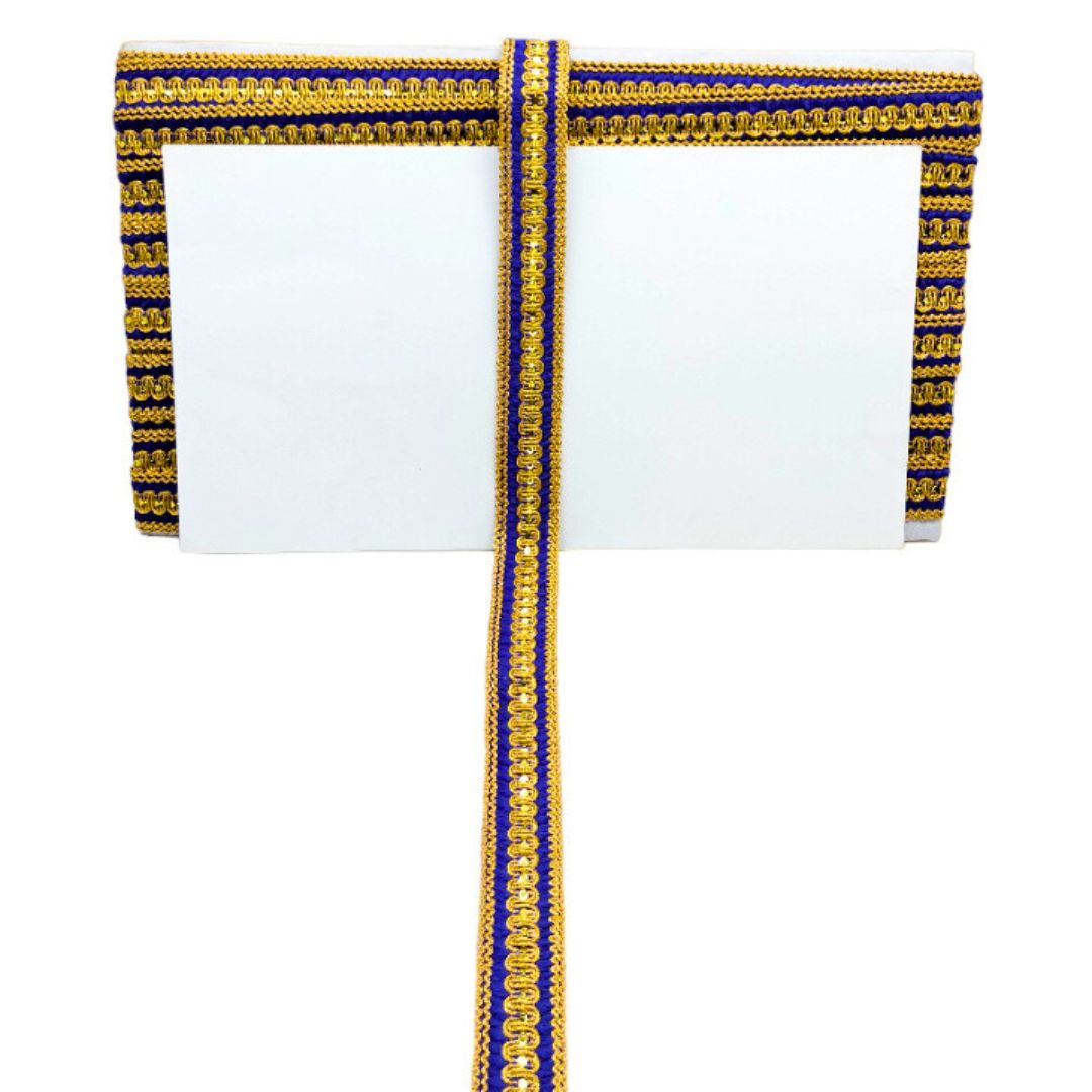 Decorative ribbon with gold and blue stripes on a white background