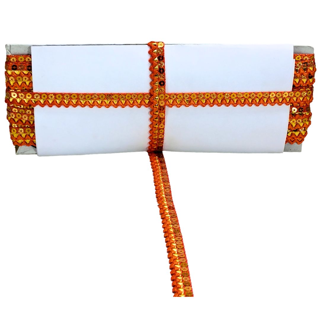 White pillow with orange decorative trim on a white background