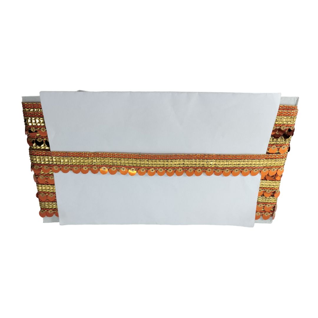Decorative white card with gold and orange trim on a white background