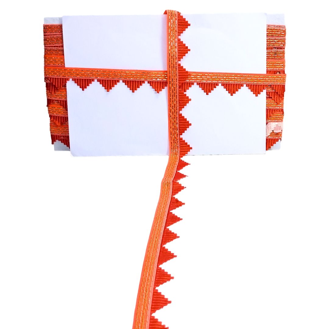 Decorative item with orange and white pattern on a white background