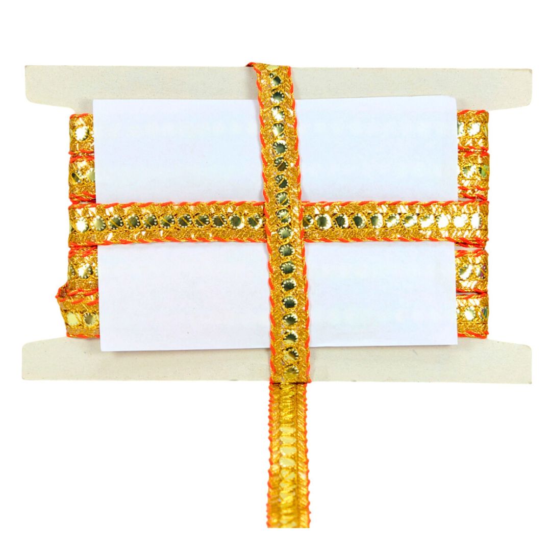 Decorative belt with orange and gold sequins on a white background