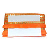 Orange decorative item with gold embellishments on a white background