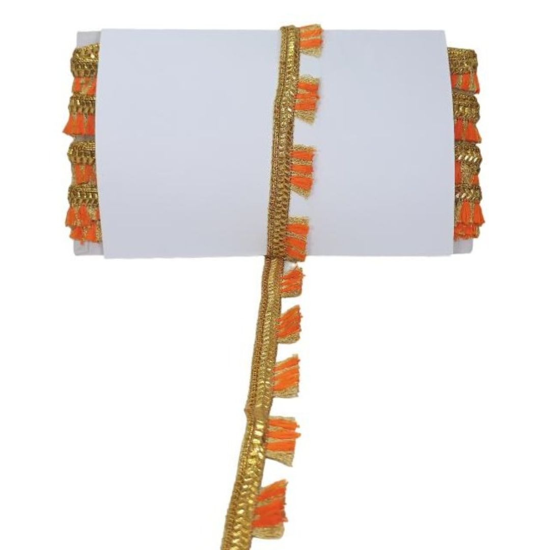 Decorative border with gold and orange tassels on a white background