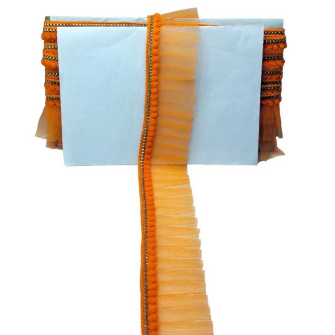 Decorative orange and black ribbon with a plain background