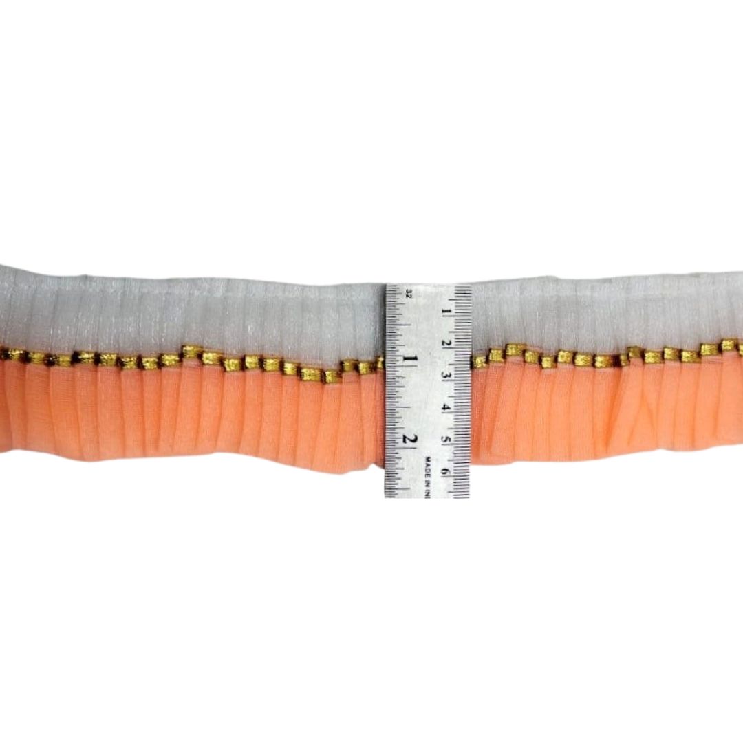 Close-up of a belt with a ruler for scale on a white background