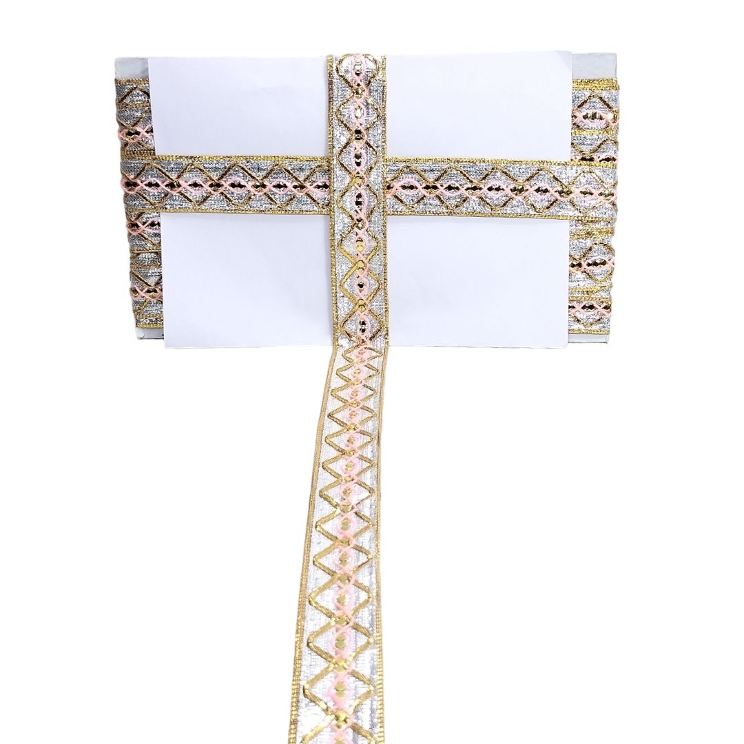 Decorative tablecloth with gold and rose gold geometric pattern on a white background