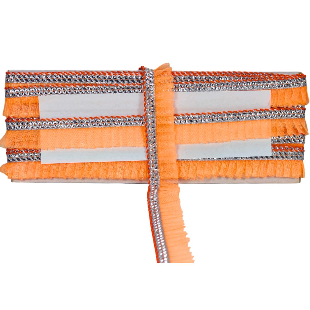 Orange safety ribbon with reflective tape on a white background