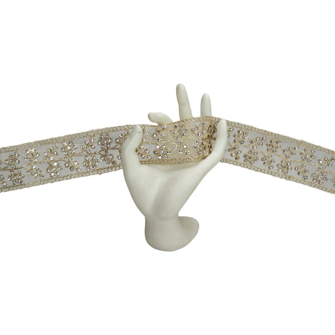 Decorative belt with rhinestones on a white background