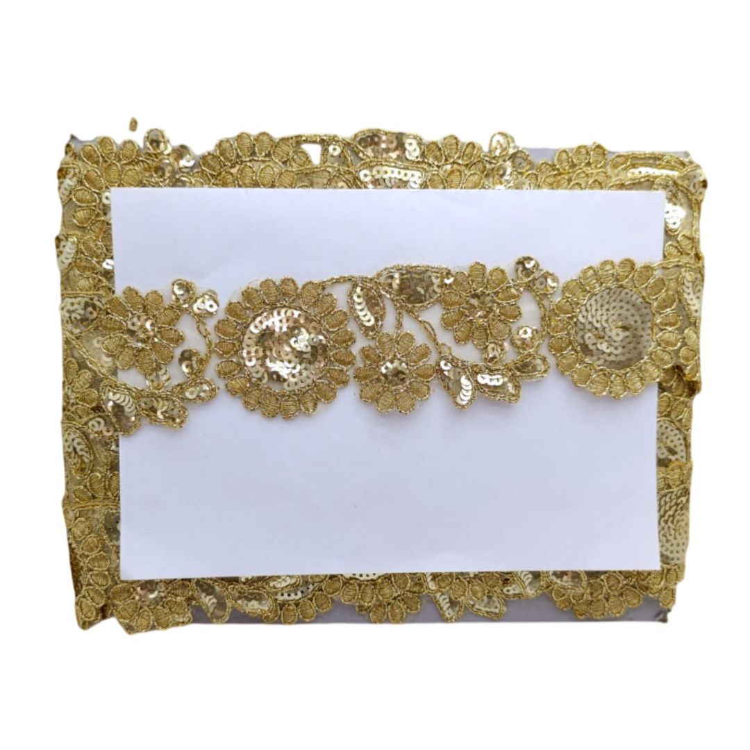Gold lace clutch bag on a white background