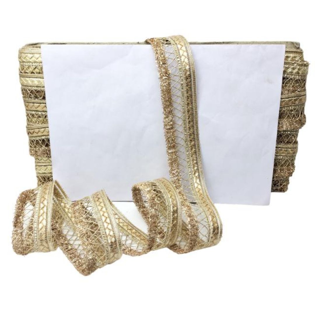 Gold decorative ribbon with a white card on a white background