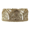 Decorative headband with lace and sequin details on a white background