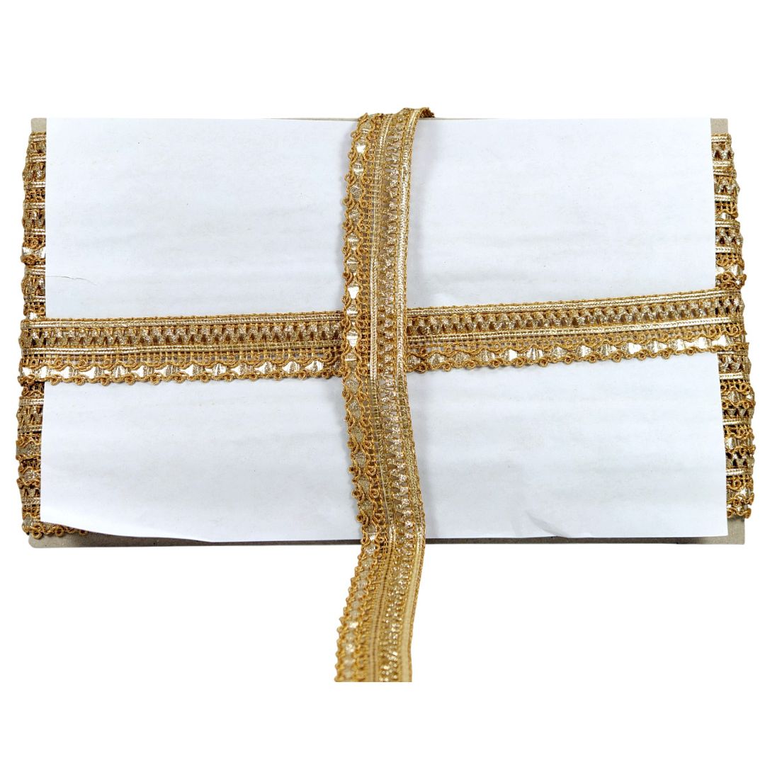 White clutch bag with gold lace trim on a white background