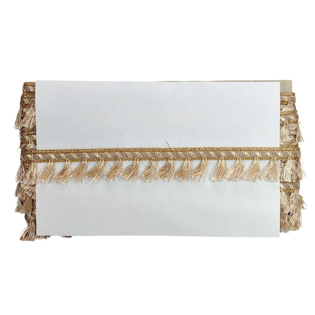 White clutch bag with Pearl Matt tassel detail on a white background