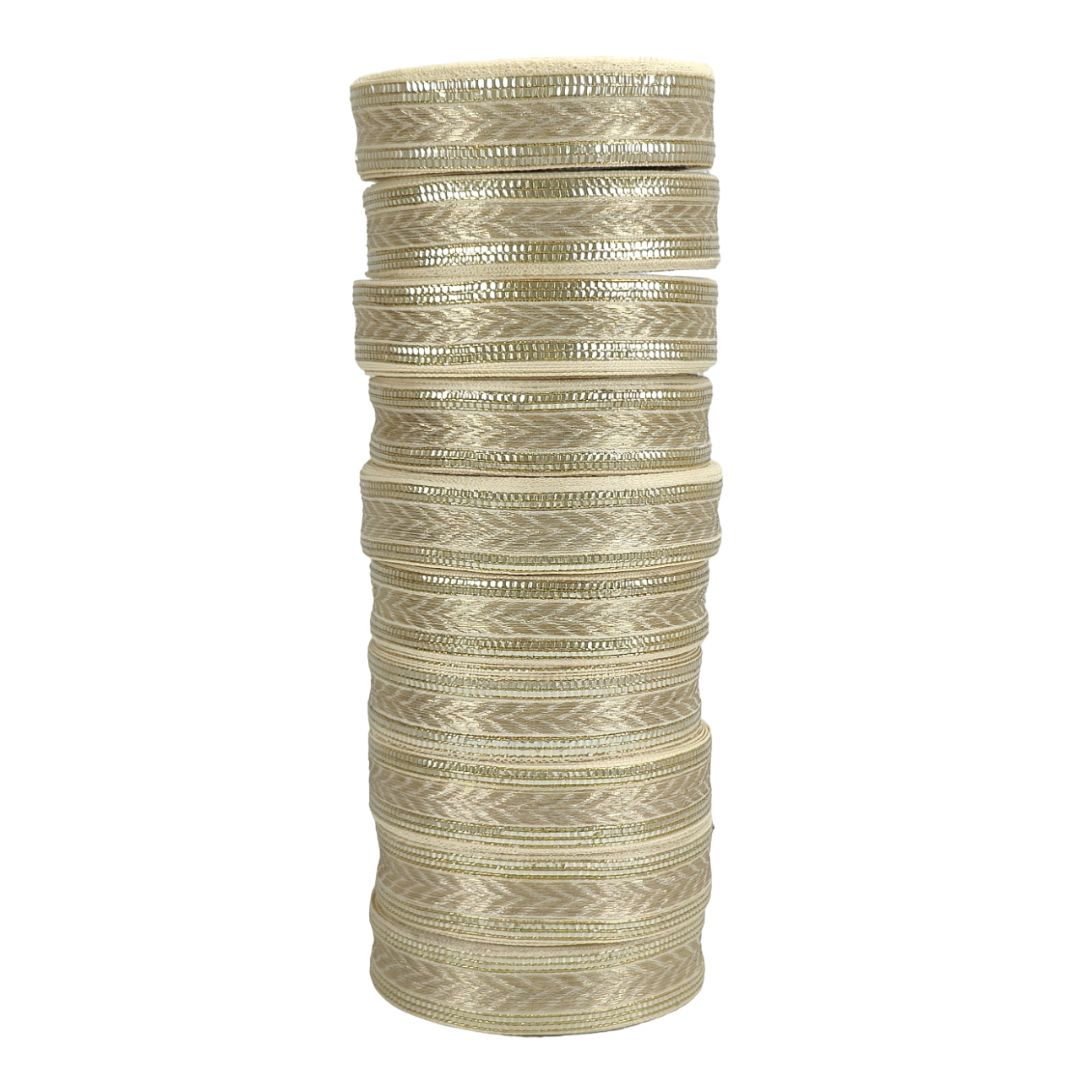 Stack of beige hair ties on a white background