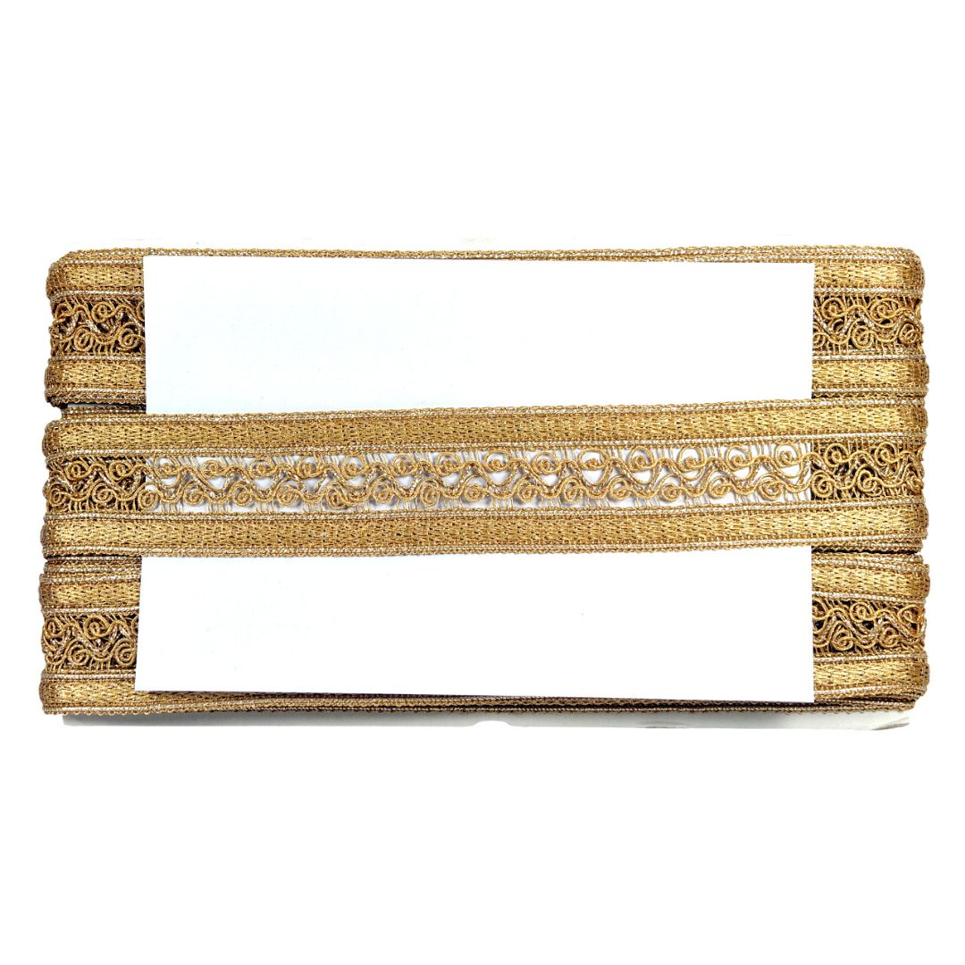 Decorative gold ribbon with intricate patterns on a white background