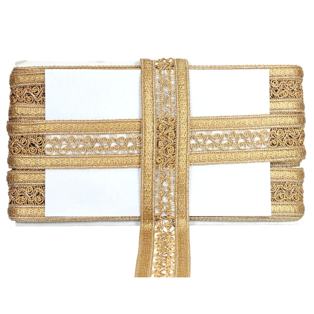 Gold lace ribbon on a white background