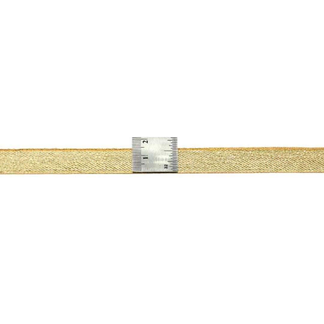 Beige belt with a silver buckle on a white background