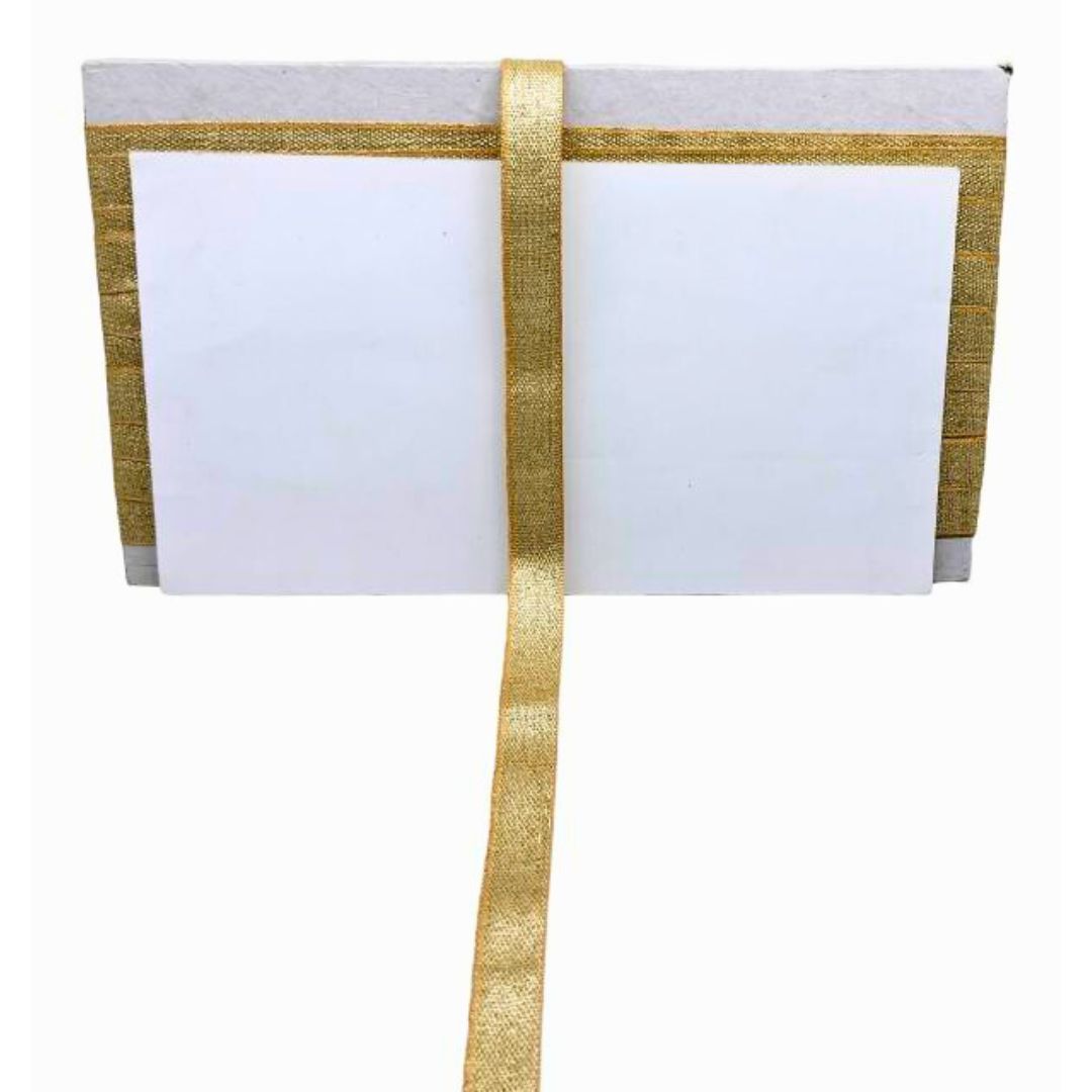 White paper with gold ribbon on a white background