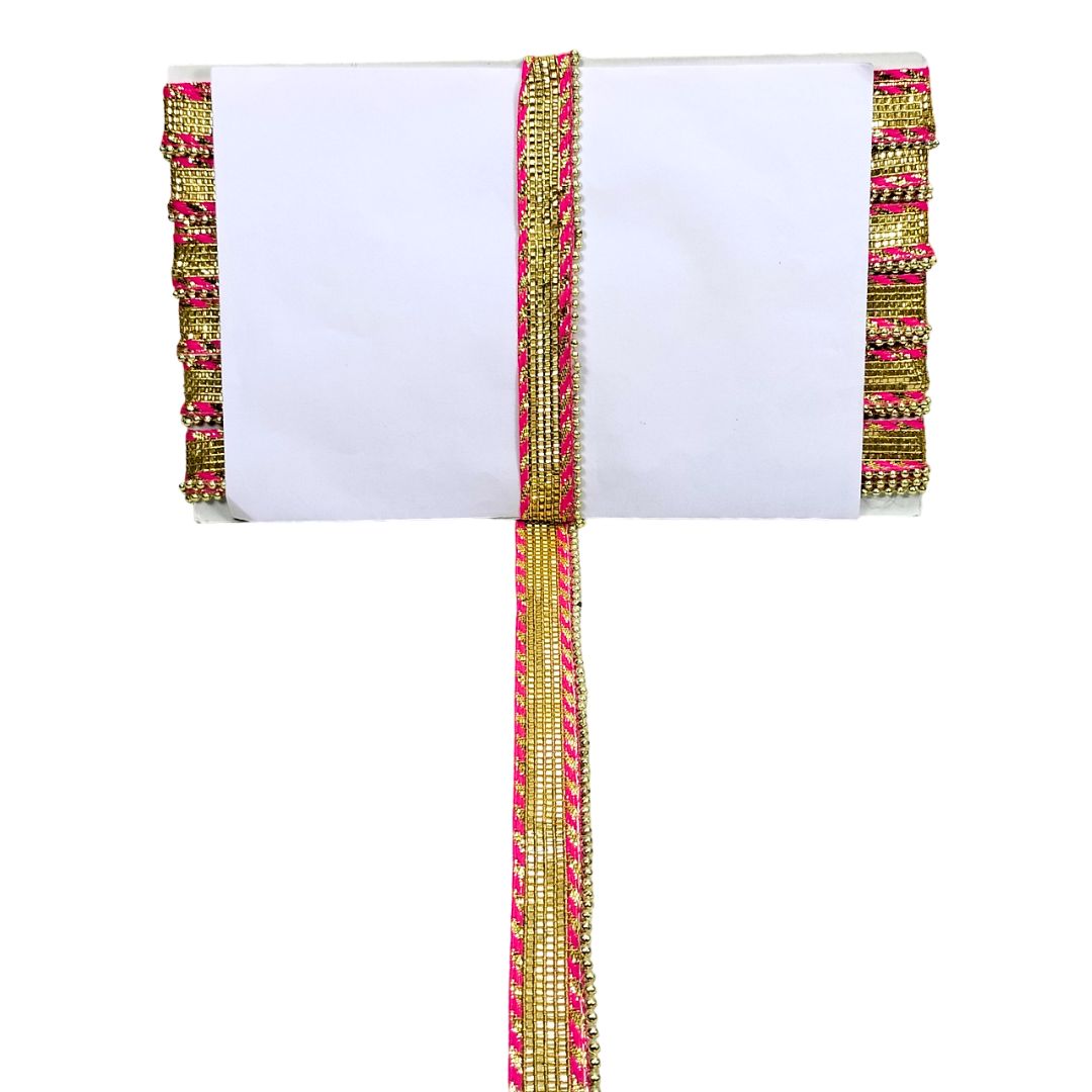 Decorative belt with pink and gold patterns on a white background