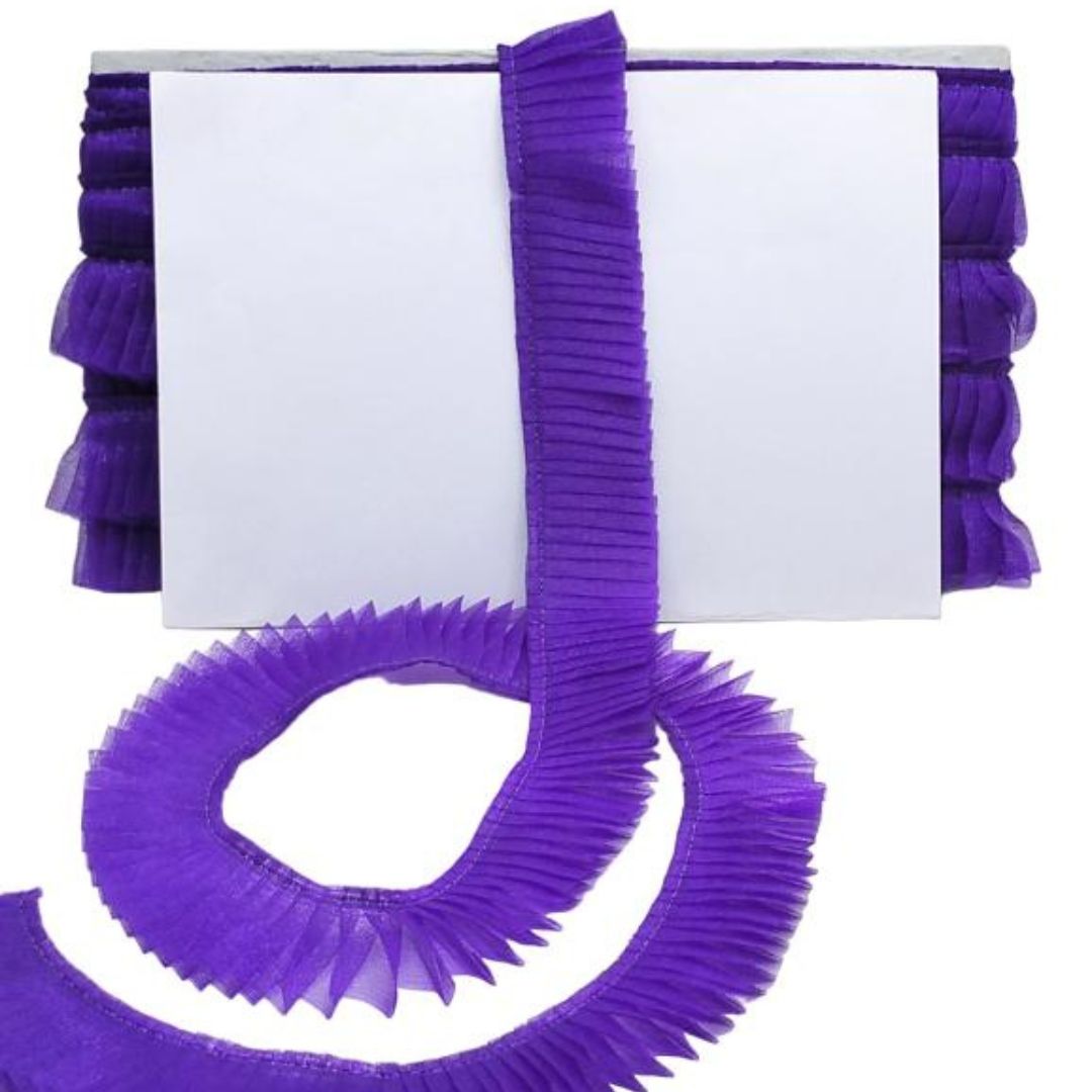 Purple ruffled trim on a white background