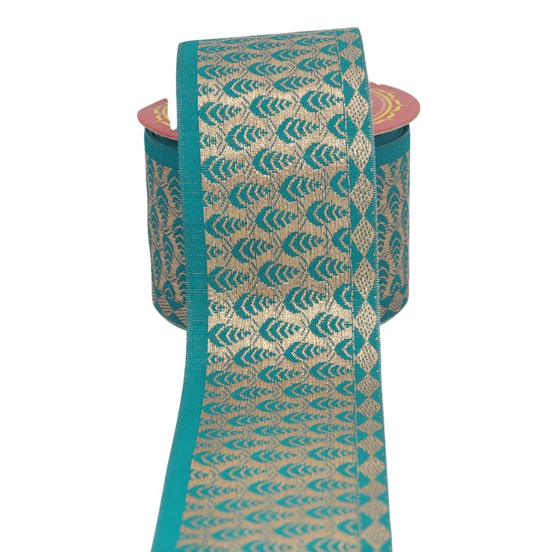 Teal and beige patterned ribbon on a white background