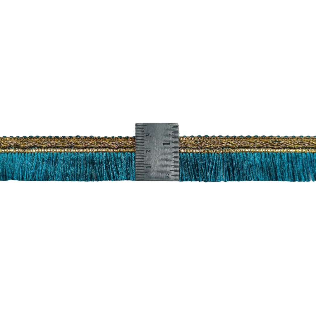 Teal fringe trim with a ruler for measurement on a white background