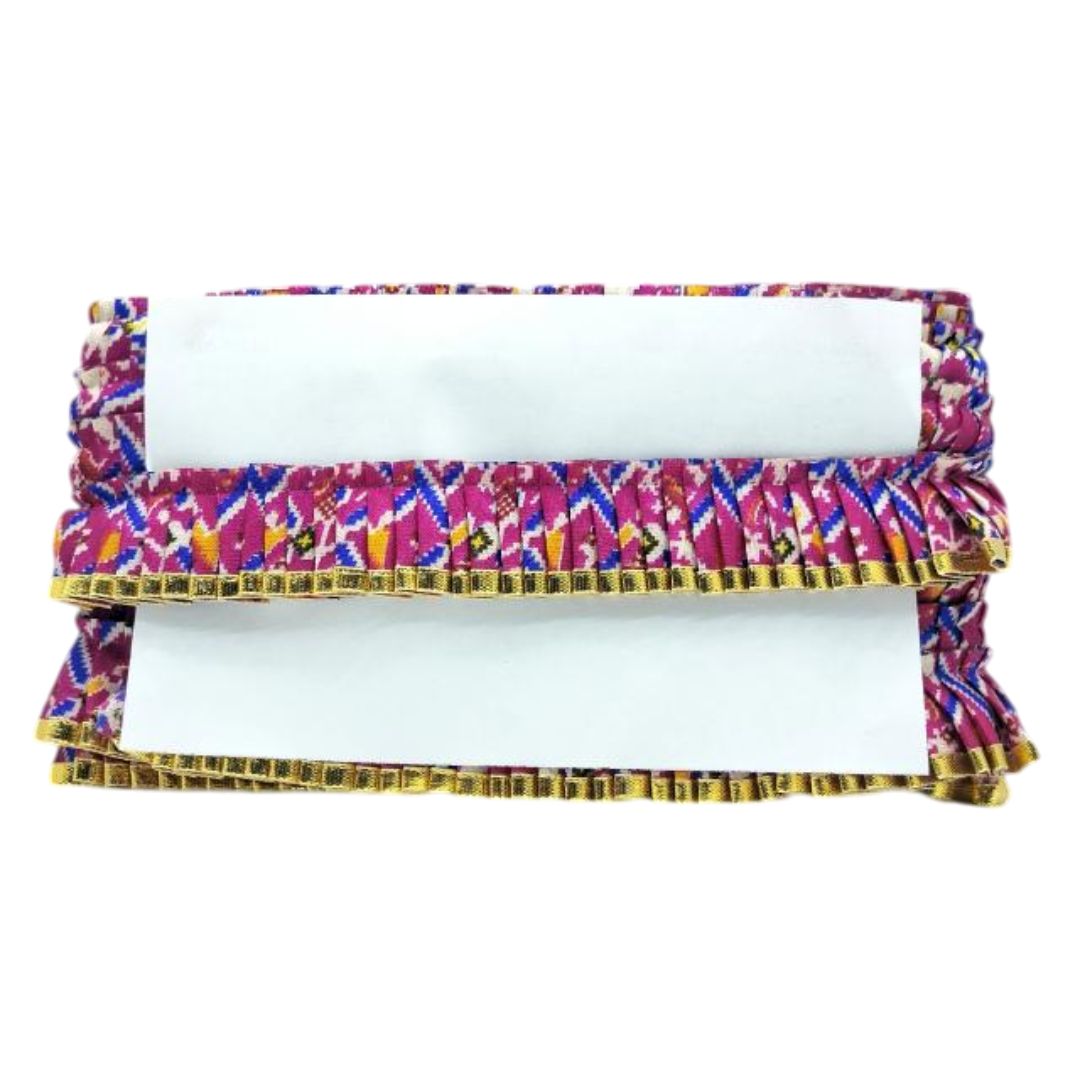 Colorful patterned clutch bag on a white background