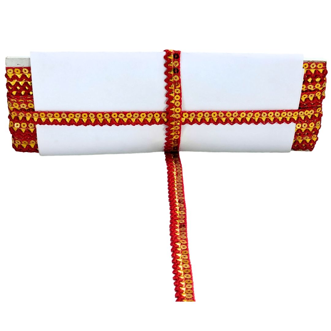 White clutch with Red and gold decorative trim on a white background