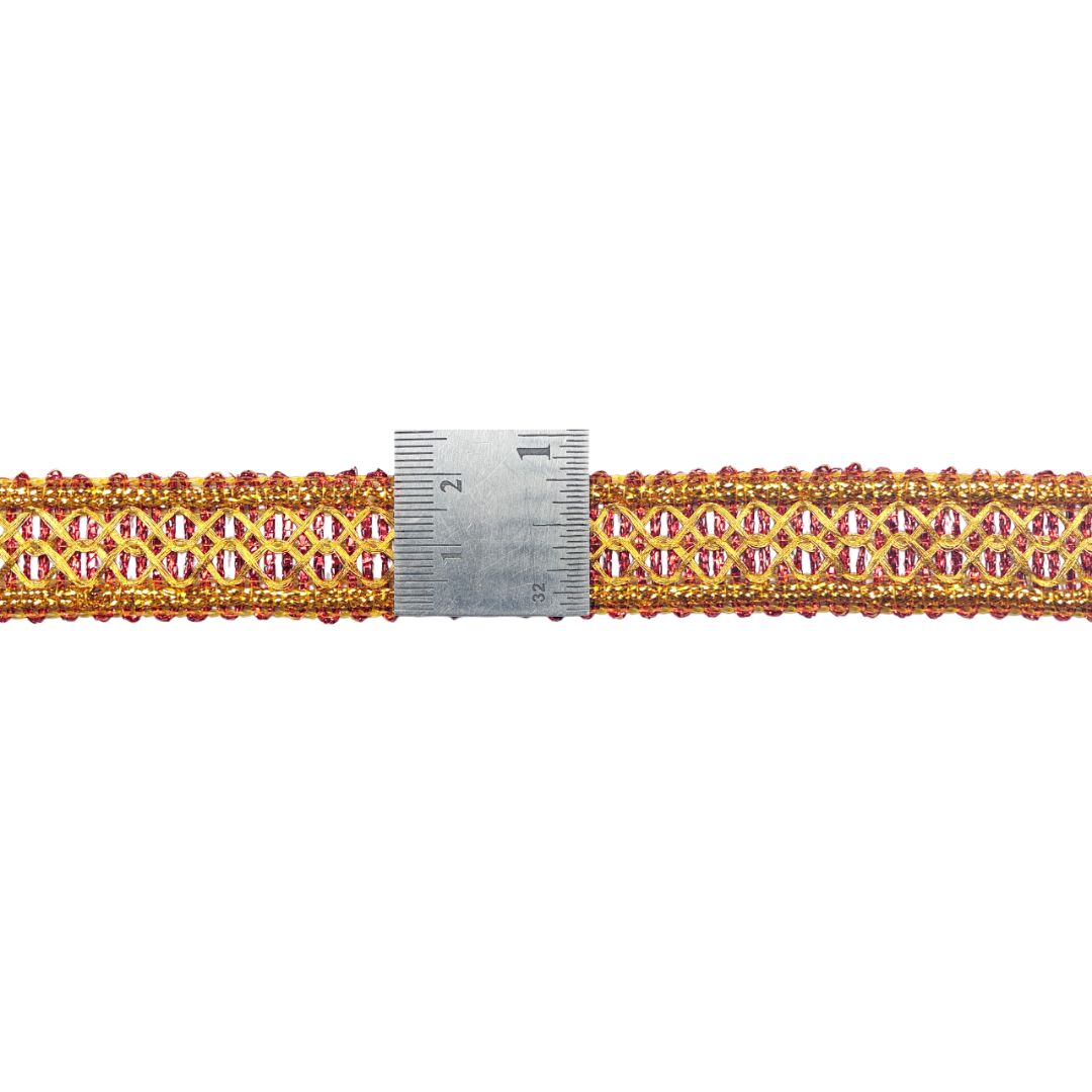 Decorative ribbon with pink and gold pattern on a white background