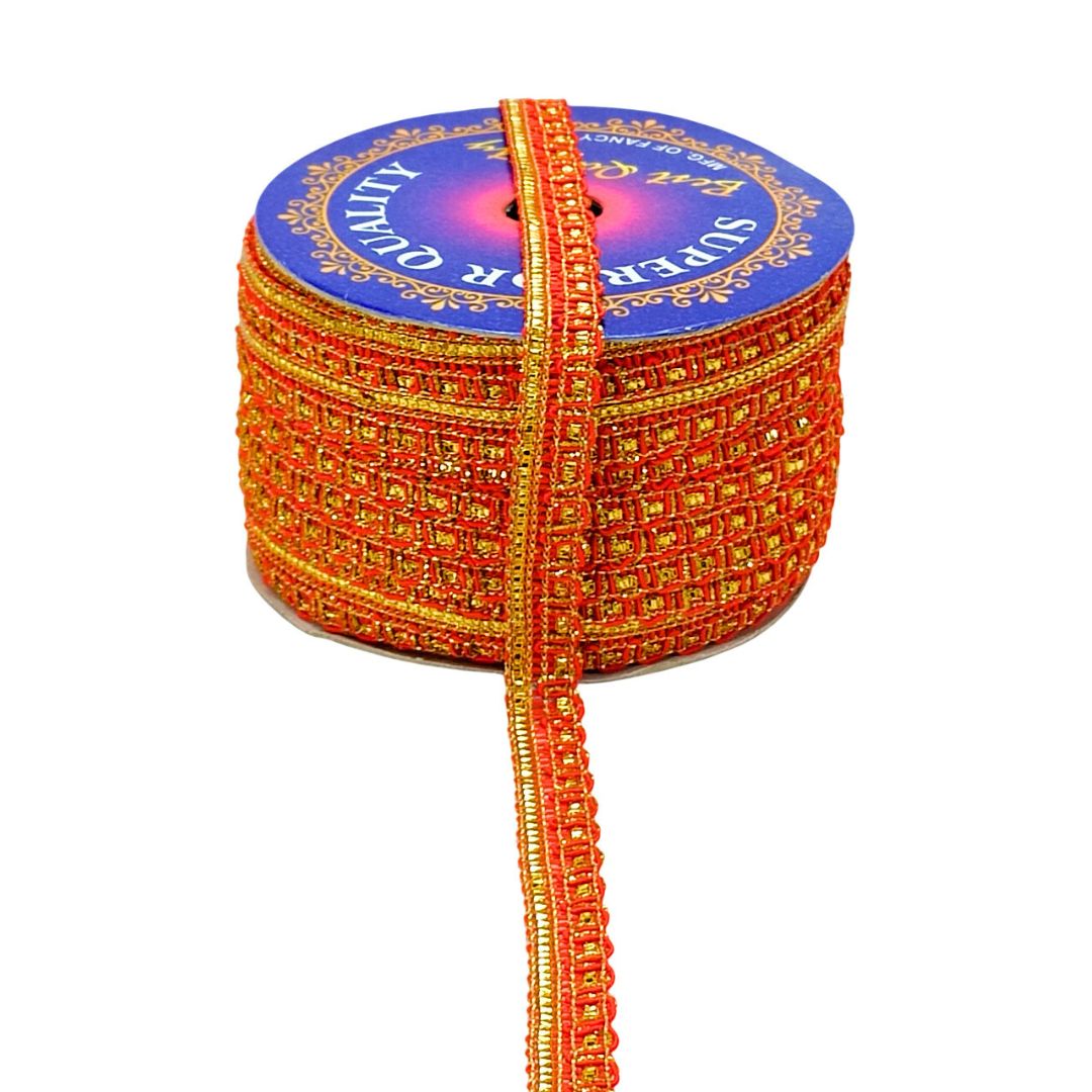 Spool of orange decorative ribbon with a blue label on a white background