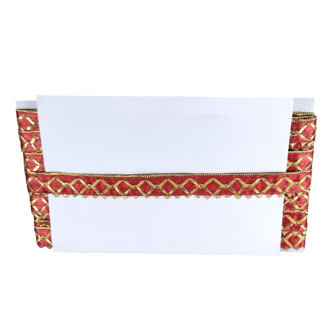 Decorative red and gold border with white paper inside on a white background