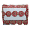 Decorative clutch with red and gold patterns on a white background