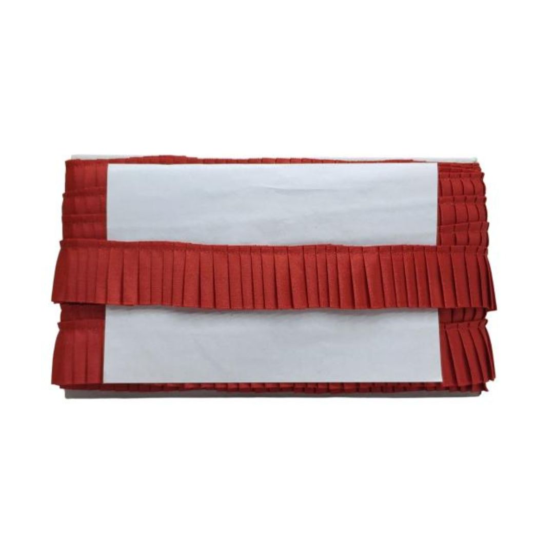 Red pleated clutch bag on a white background