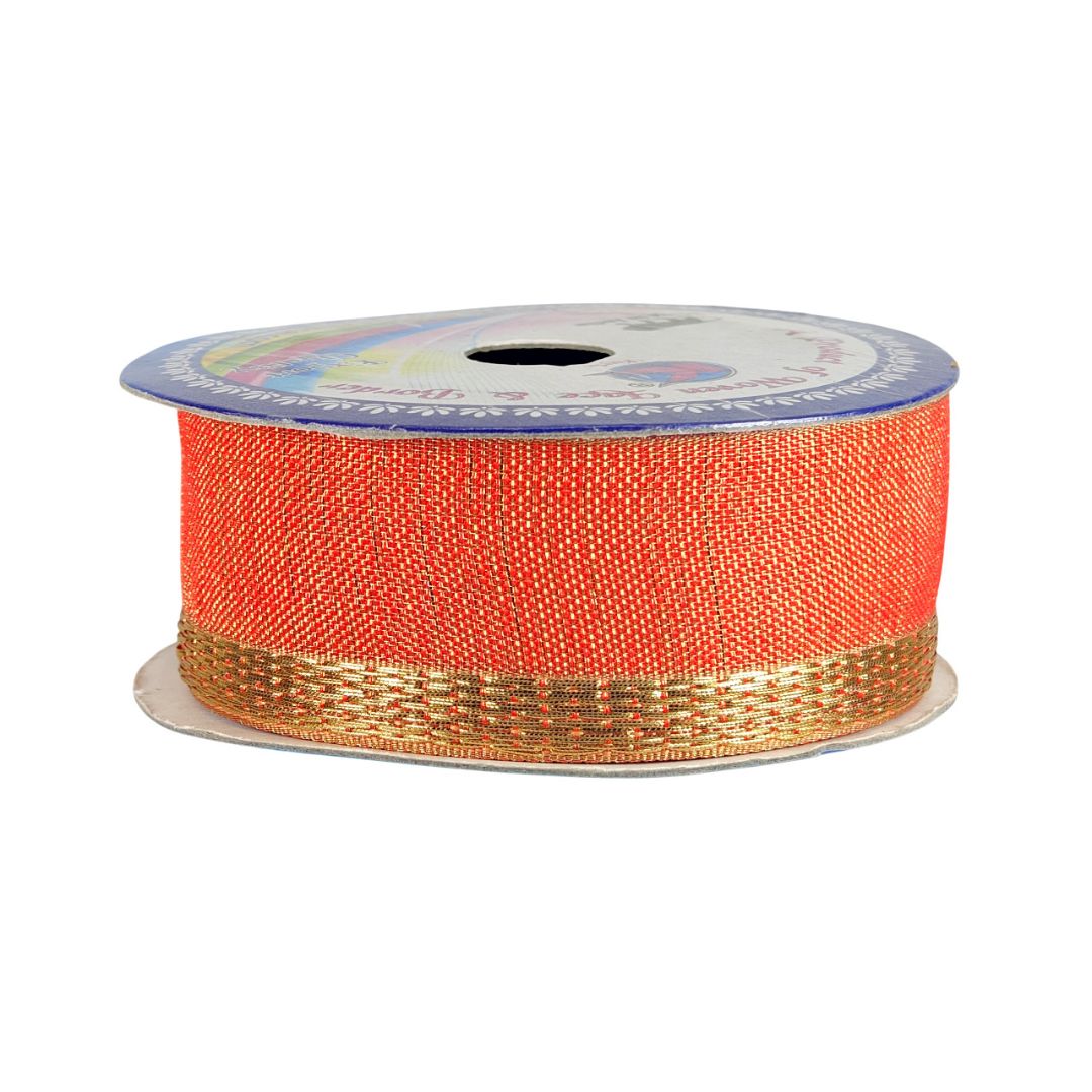 Spool of orange ribbon with gold edge on a white background