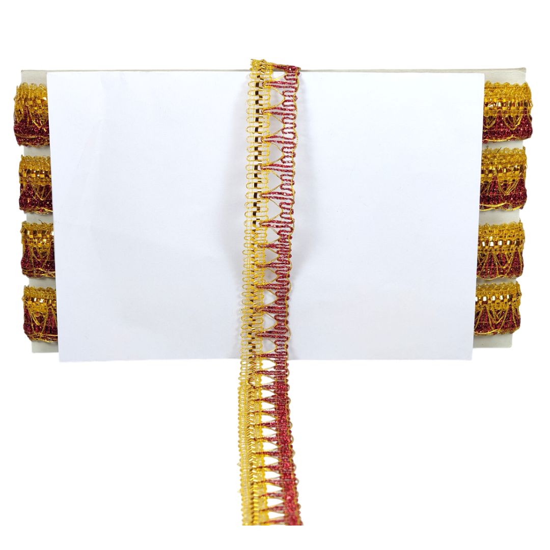 Decorative gold and red trim on a white background
