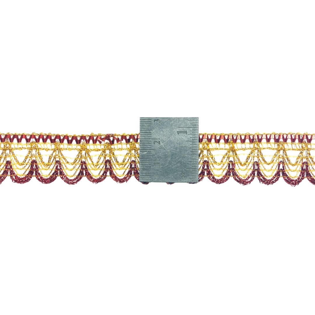 Decorative border with gold and red pattern on a white background