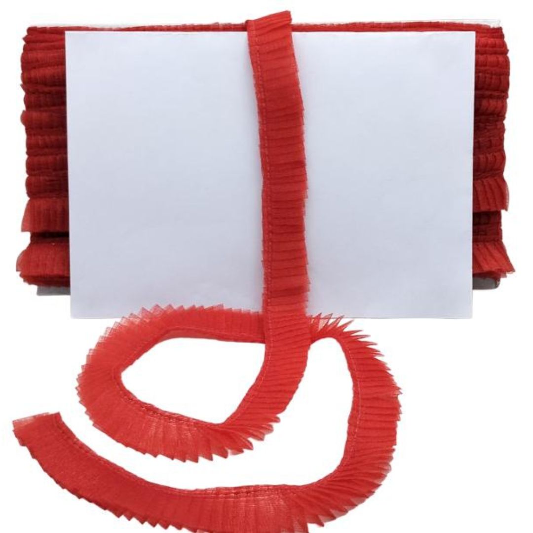 Red ribbons with a white card on a white background
