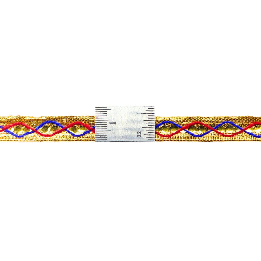 Decorative ribbon with gold, red, and blue pattern on a white background