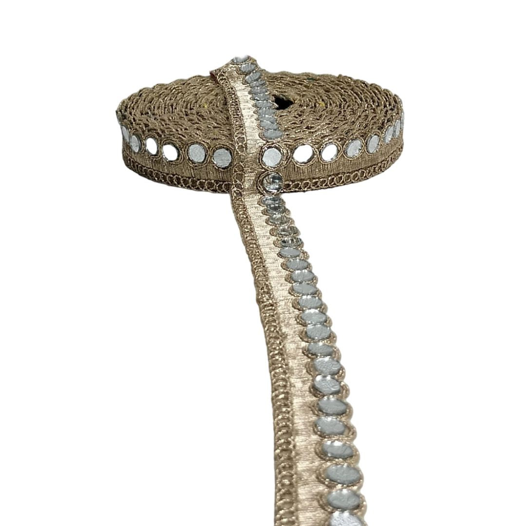 Decorative ribbon with mirror beads on a white background