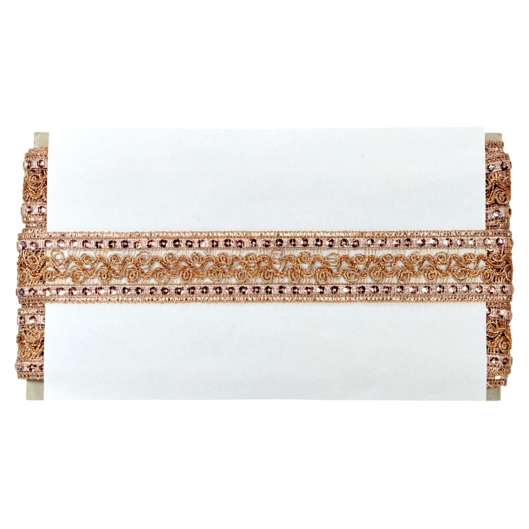 White clutch with gold embellishments on a white background