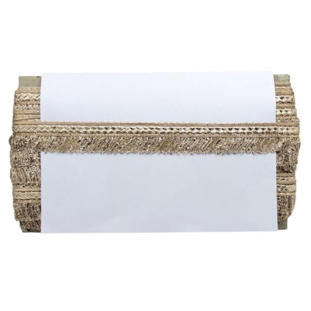White clutch with gold woven strap on a white background