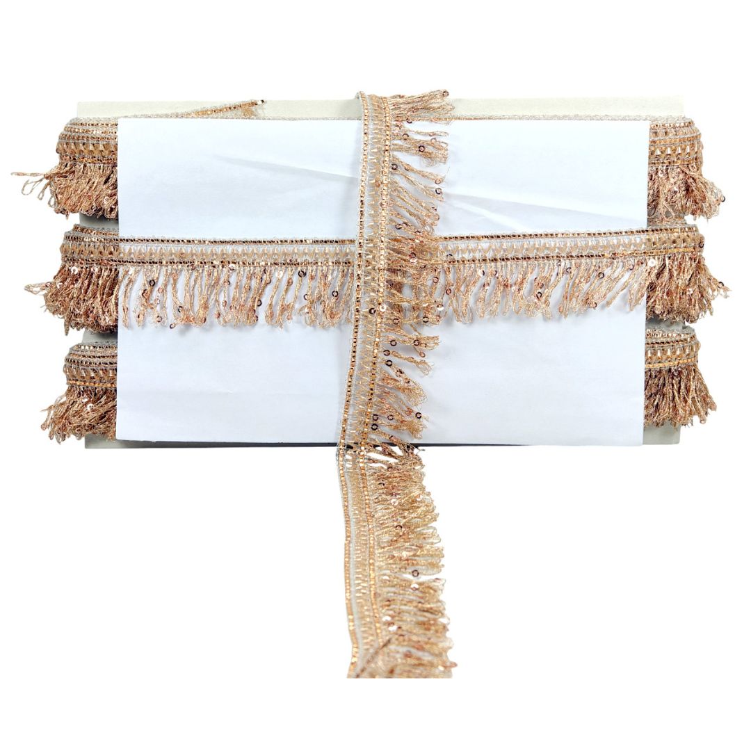 White box with burlap ribbon and fringe on a white background