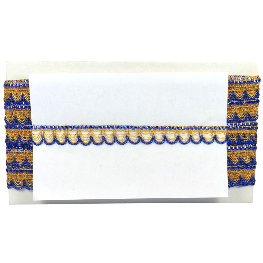 Decorative table runner with blue and gold patterns on a white background