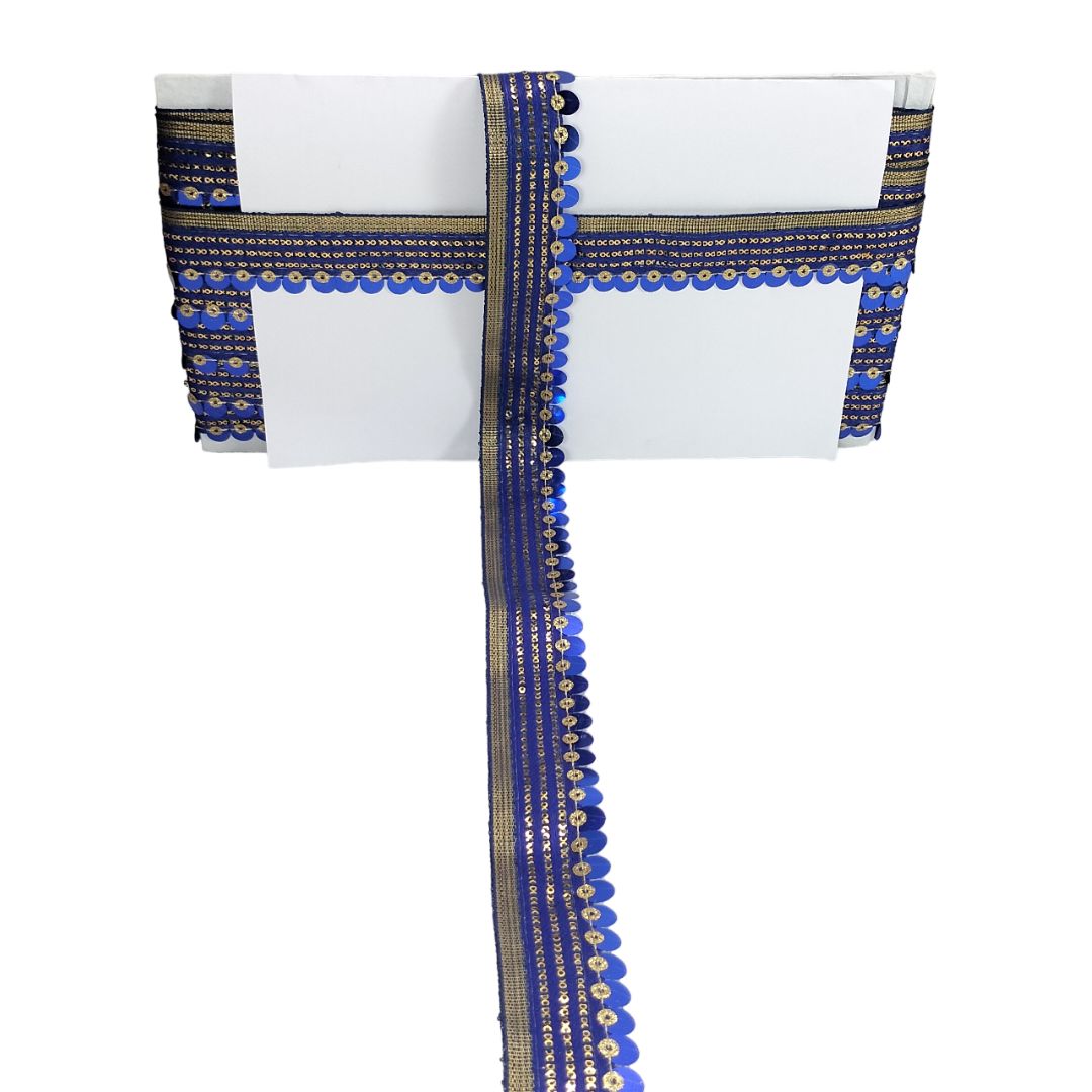 White saree with blue and gold border on a white background