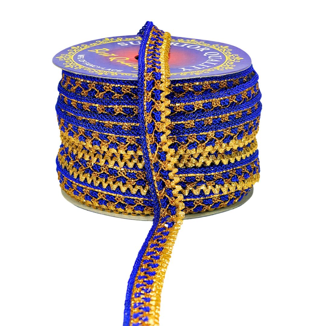 Spool of blue and gold lace ribbon on a white background