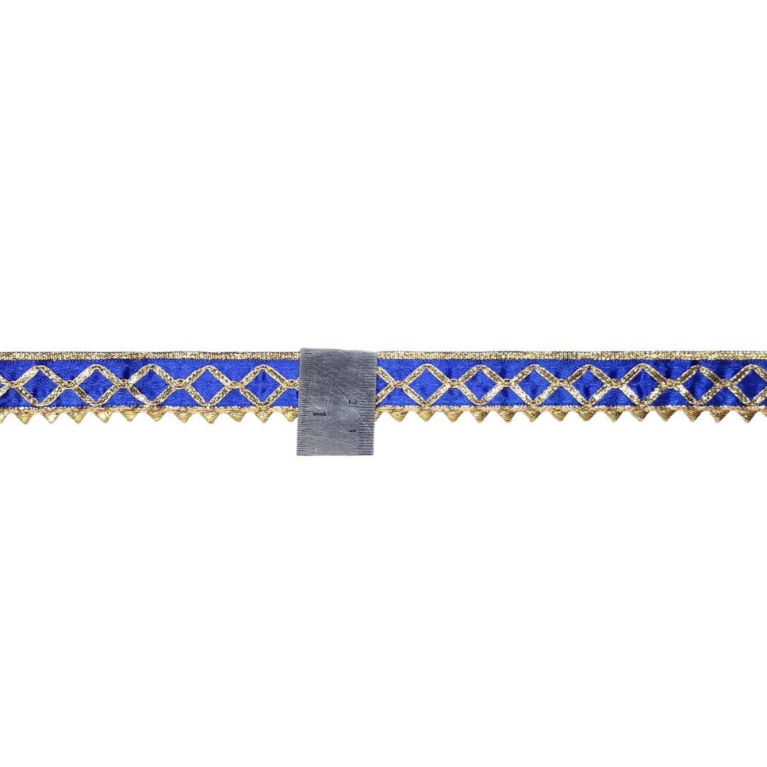 Decorative ribbon with blue and gold pattern on a white background