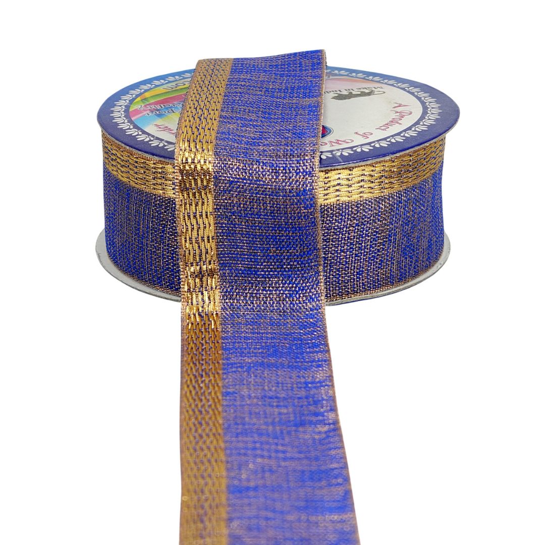 Spool of blue and gold ribbon on a white background