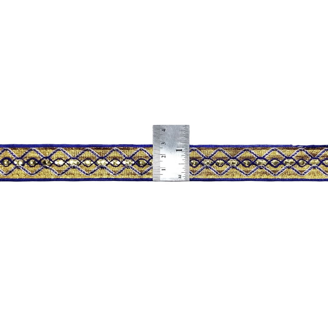 Decorative ribbon with a ruler for scale on a white background