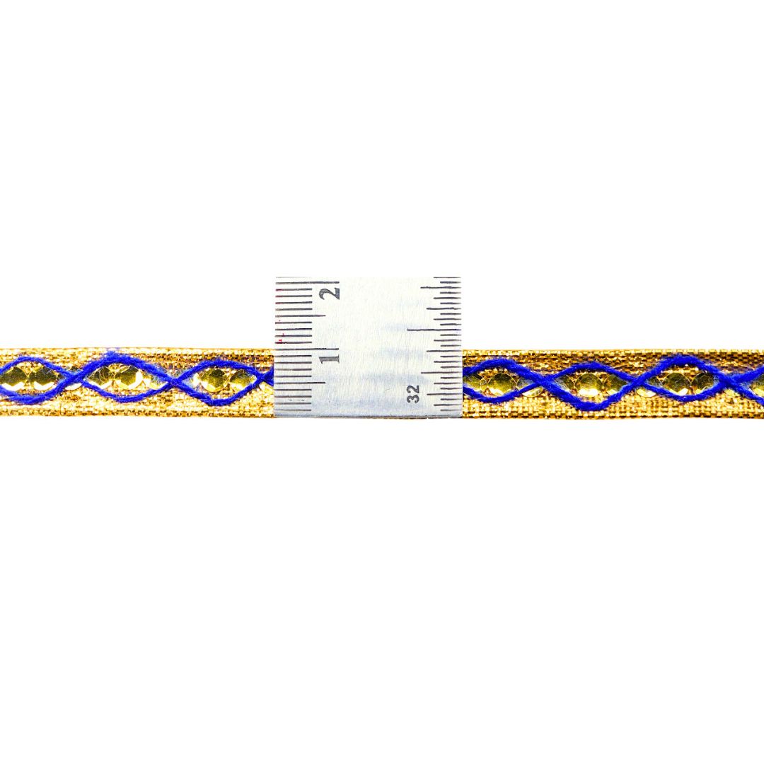 Gold and blue woven ribbon with a ruler for scale on a white background